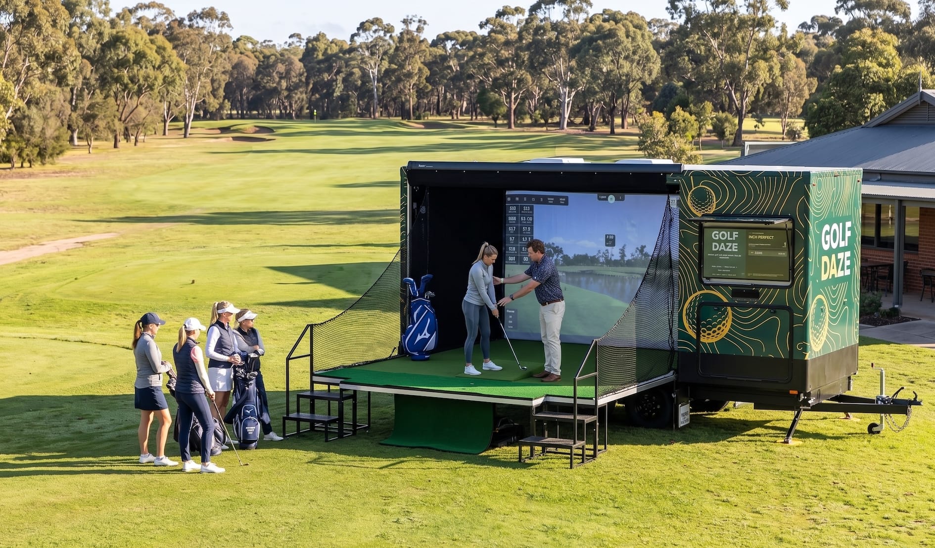 Coach working with a player at a Golf Daze women's clinic on a golf course, with the group waiting their turn